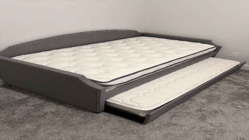 Upholstered bed and mattress removed in Raleigh, NC
